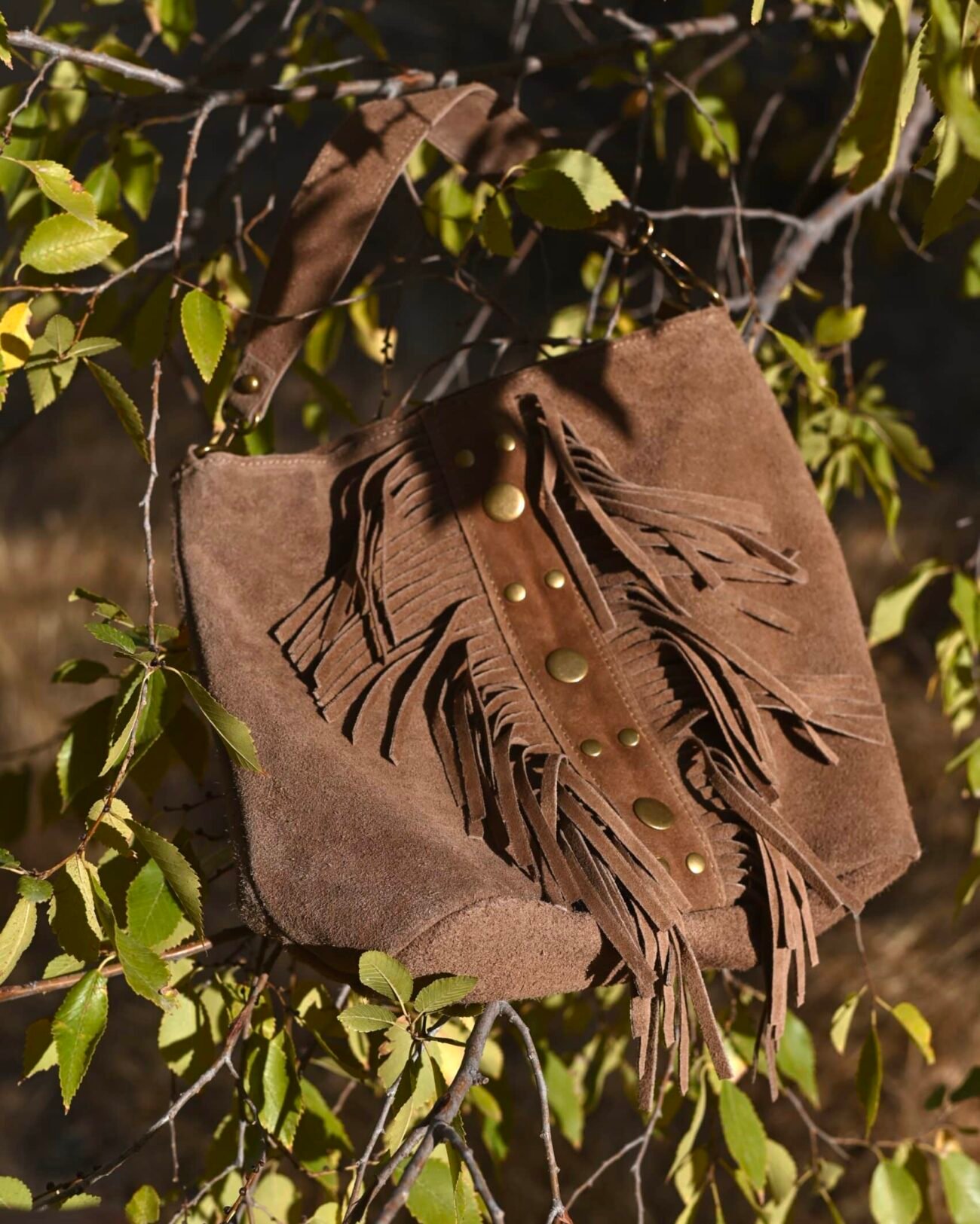 Bolso piel flecos